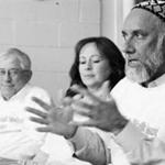 Tunde Dawodu, left, Bill Phipps, Rev. Tara Livingston and Syed Soharwardy provide details Friday on a countrywide walk against violence. "This walk will show that every religion is against violence," Soharwardy says.